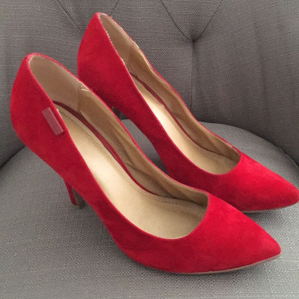 Red suede pumps